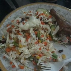 A picture of Salad with chicken.