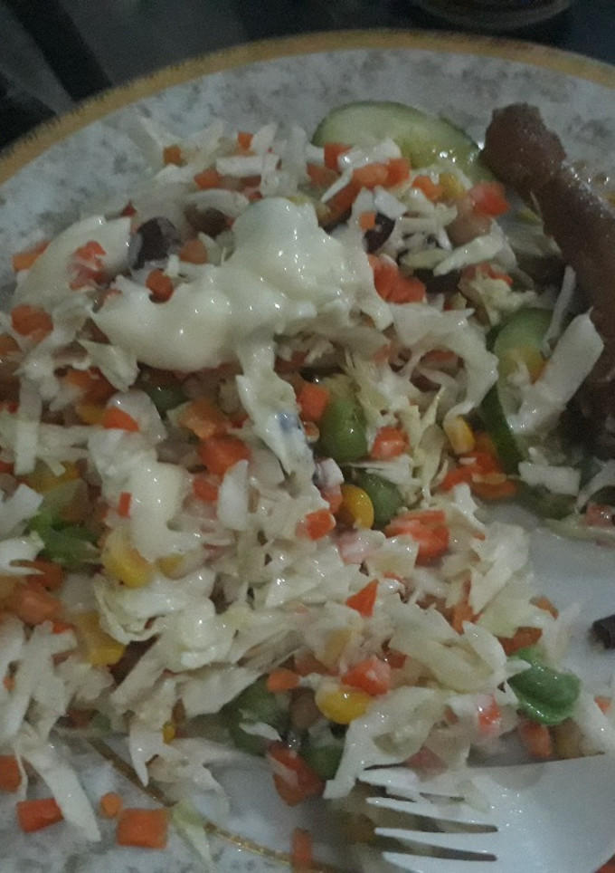 A picture of Salad with chicken.