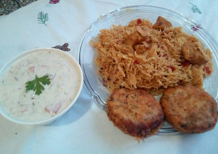 Recipe of Quick Achari Chicken Rice with Raita