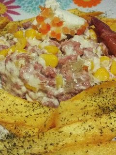 Una foto de Carne con mousse de nueces y maíz