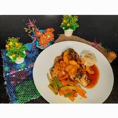 A picture of Chicken steak with spicy mexican sauce.