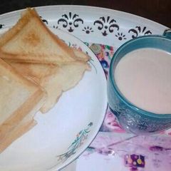 A picture of Toasted bread and tea.