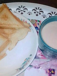 A picture of Toasted bread and tea.