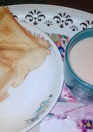A picture of Toasted bread and tea.
