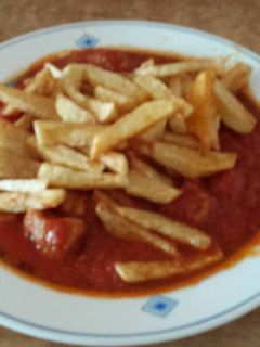 Una foto de Tomate frito con carne
