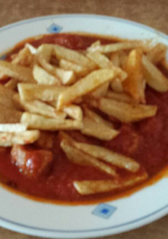 Una foto de Tomate frito con carne