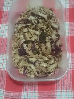 Una foto de Fideos cinta con salsa roja al Malbec