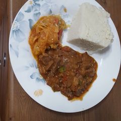 A picture of Beef, cabbage and ugali.