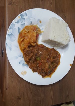A picture of Beef, cabbage and ugali.