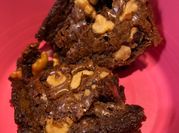 A picture of chocolate fudge with walnuts