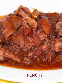 Una foto de Chipirones con jamón ibérico en salsa