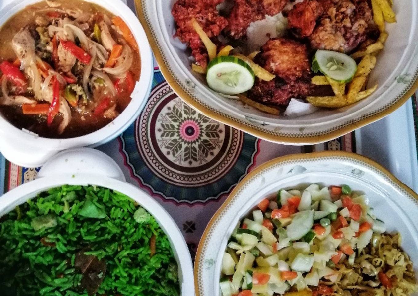 Fried rice, potato salad, shredded chicken and KFC chicken