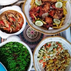 A picture of Fried rice, potato salad, shredded chicken and KFC chicken.