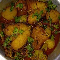 A picture of Bhetki (Barramundi) fish curry.