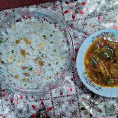 A picture of Chicken Chilli with Mexican Fried Rice.