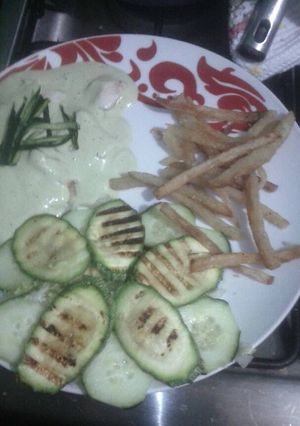 Una foto de Filete de pescado en crema de brocoli