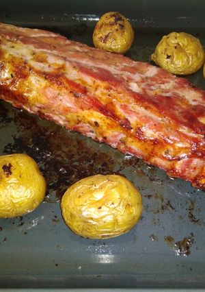 Foto principal de Costillas adobadas al horno con patatas