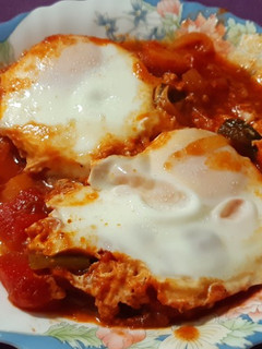 Una foto de Huevos con pisto