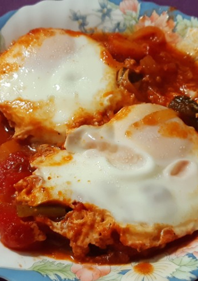 Una foto de Huevos con pisto