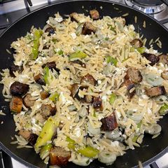 A picture of Orzo pasta with broad beans, asparagus and feta.