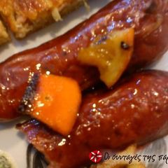 Country sausages with citrus fruits A picture of Country sausages with citrus fruits.