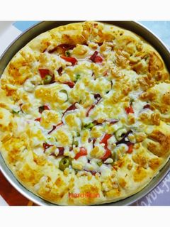 صورة لوصفة بيتزا محشوه الاطراف 🍕