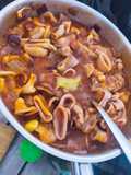 Calamares en Salsa con Arroz y Mariscos