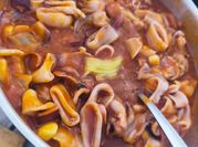 Una foto de escabeche de calamar