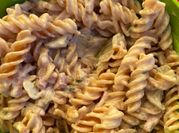 Una foto de fusilli al perejil