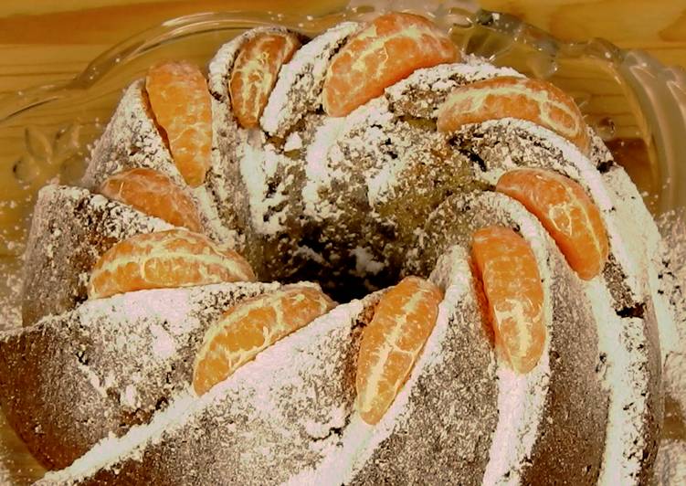 Tangerine cake with hazelnuts and chocolate chunks