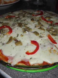 Una foto de Pizza en horno microondas