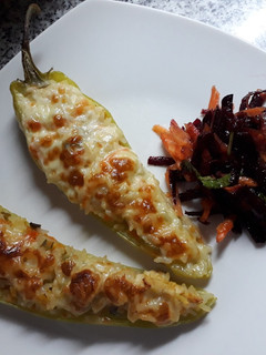 Una foto de Ají relleno con risotto de pollo