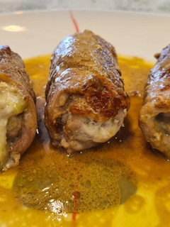 Una foto de Rollitos de cerdo al pesto