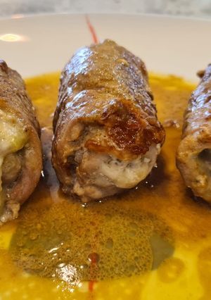 Una foto de Rollitos de cerdo al pesto