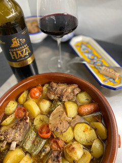 Una foto de Cordero con patatas al horno