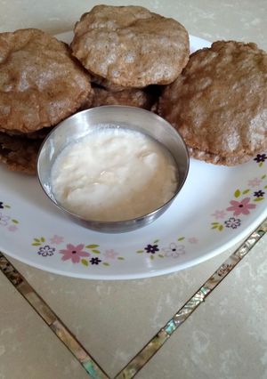 A picture of Taro root/arbi & water chestnut flour poori.