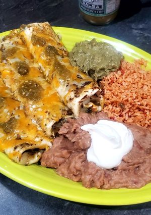 A picture of Chicken Enchiladas.