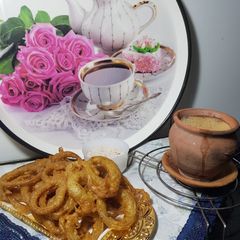 Onion snacks with matka tea😋 A picture of Onion snacks with matka tea😋.