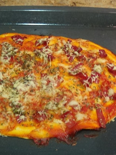 Una foto de Pizza de jamón y queso