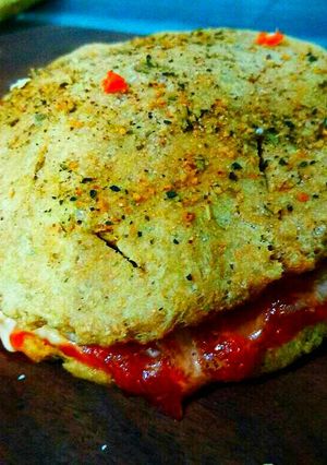 A picture of Brown pizza burger.
