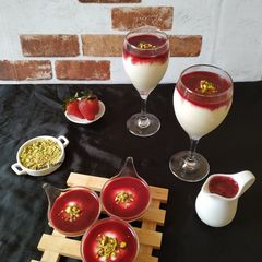 A picture of Malabi with strawberry coulis.