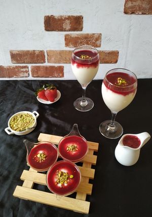 A picture of Malabi with strawberry coulis.