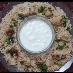A picture of Aloo gobi mutter tehri.