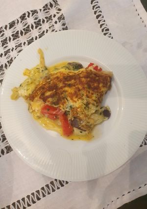 Una foto de Omelette câpres con jugo verde