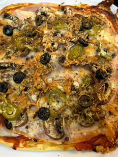 Una foto de Pizza con base de harina de garbanzos en airfryer Cosori