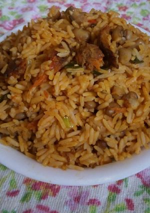 A picture of Palm oil jallop rice and beans.