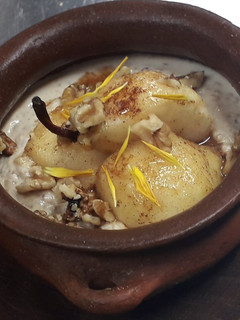 Una foto de Arroz con leche y pera asada especiada