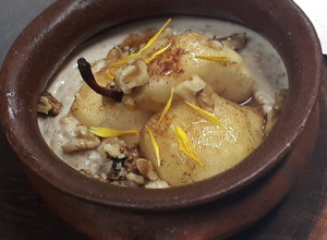 Una foto de Arroz con leche y pera asada especiada