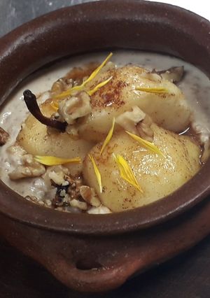 Una foto de Arroz con leche y pera asada especiada