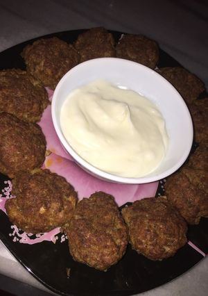 A picture of Baked Kofta with Garlic Sauce.